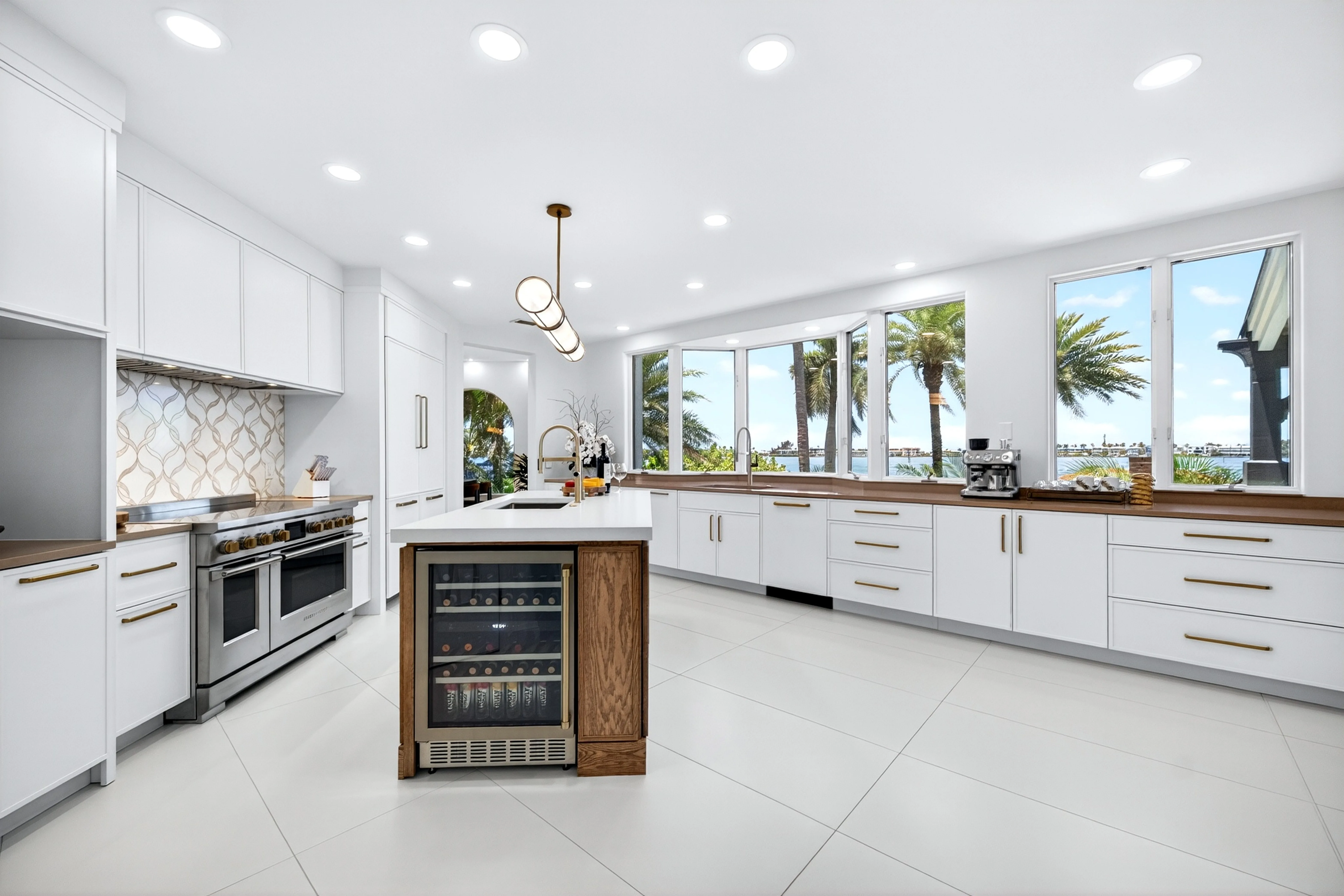 Chef's kitchen with professional range and water view