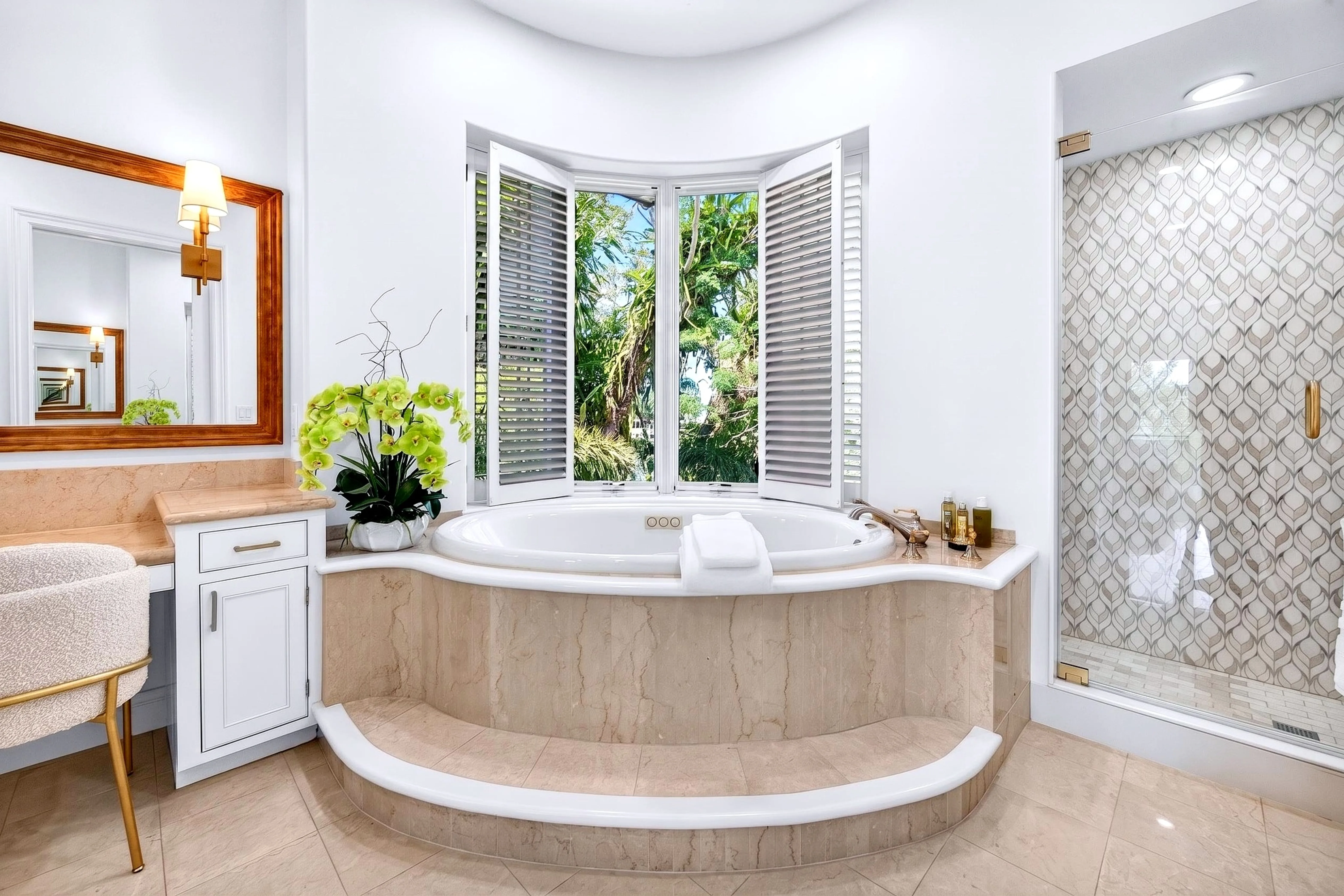 Garden tub set in the bay window of the primary bath