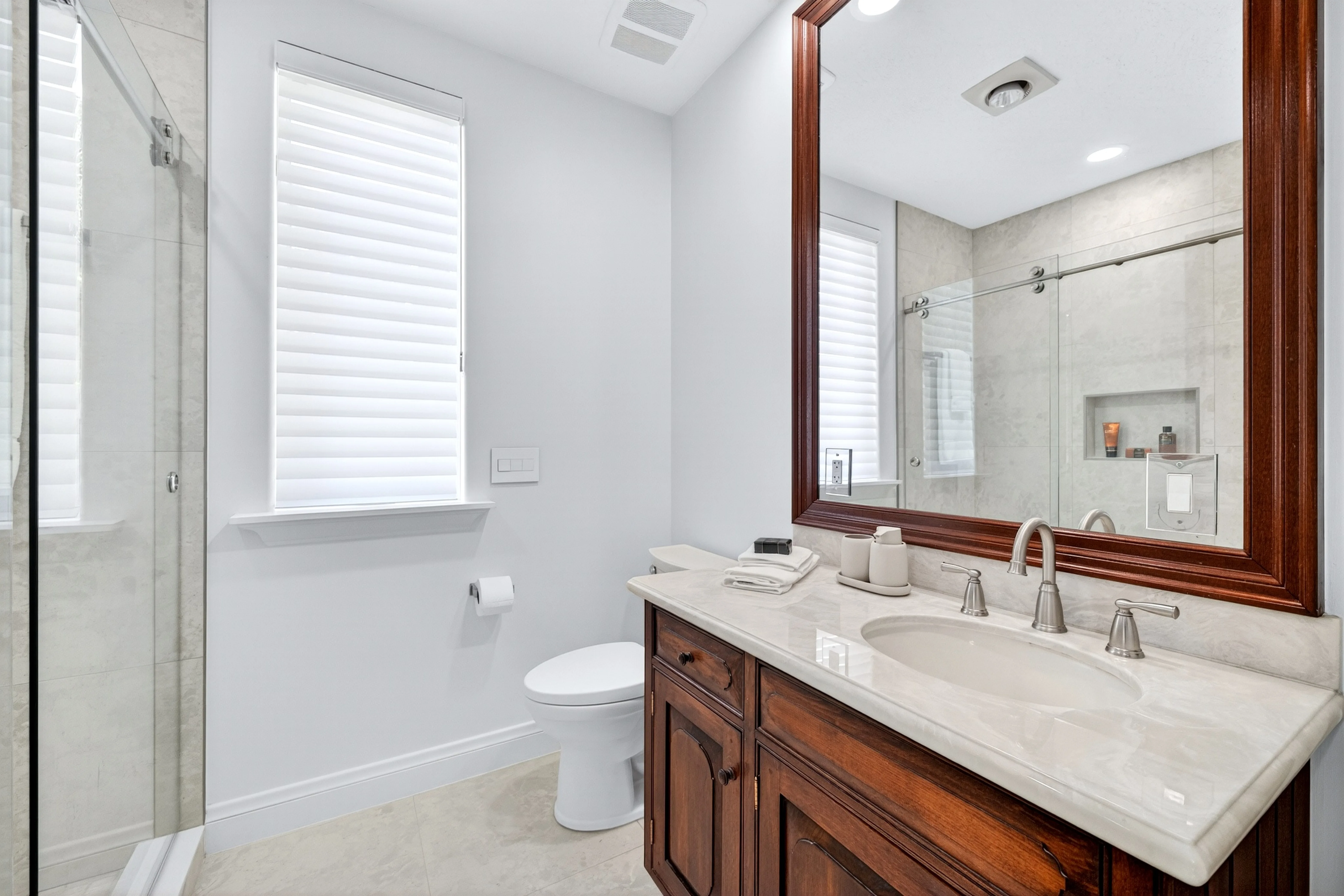 Guest bath with full shower and vanity