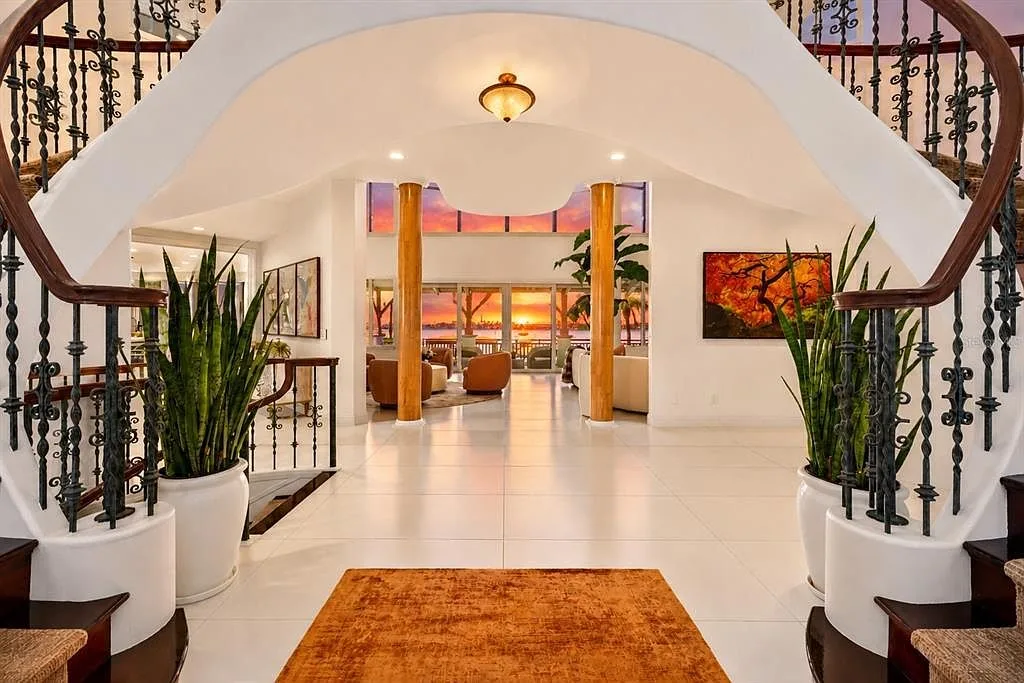 Grand foyer at sunset, water glow through the windows