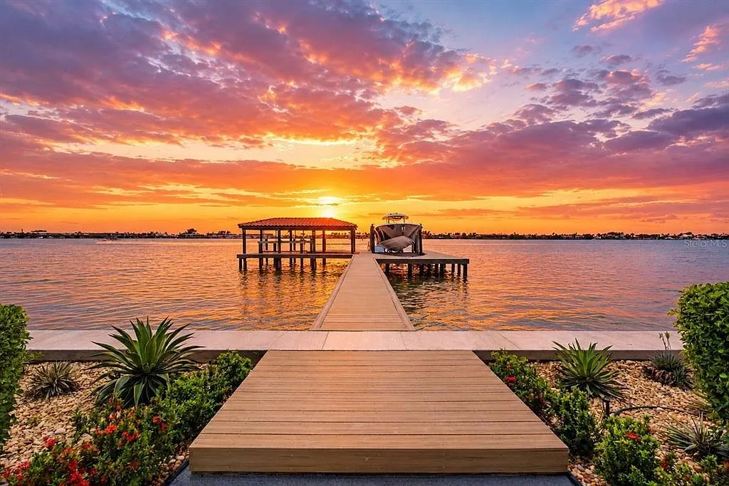 Private dock at vivid sunset over Anna Maria Sound