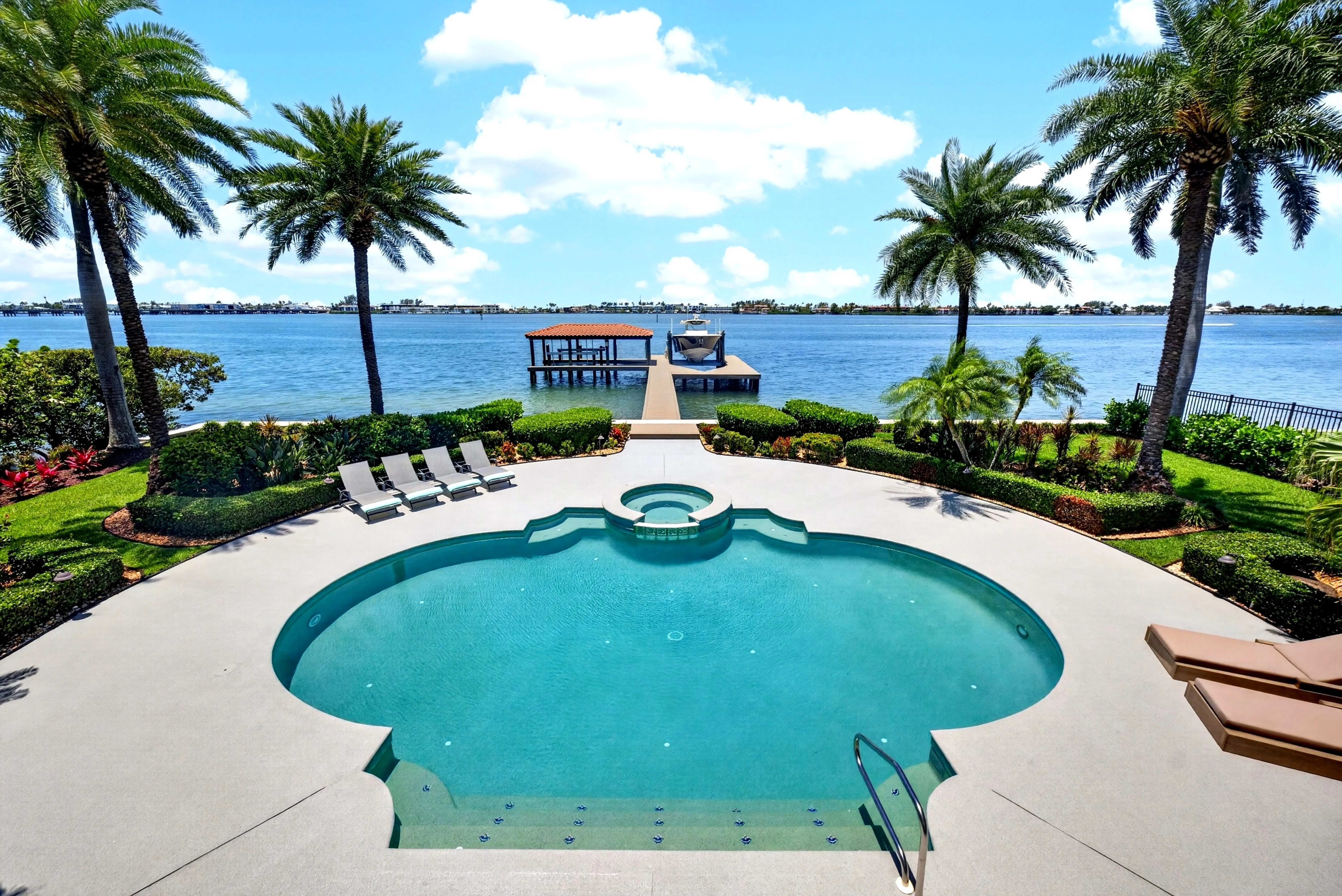 Pool, spa, and private dock on Anna Maria Sound