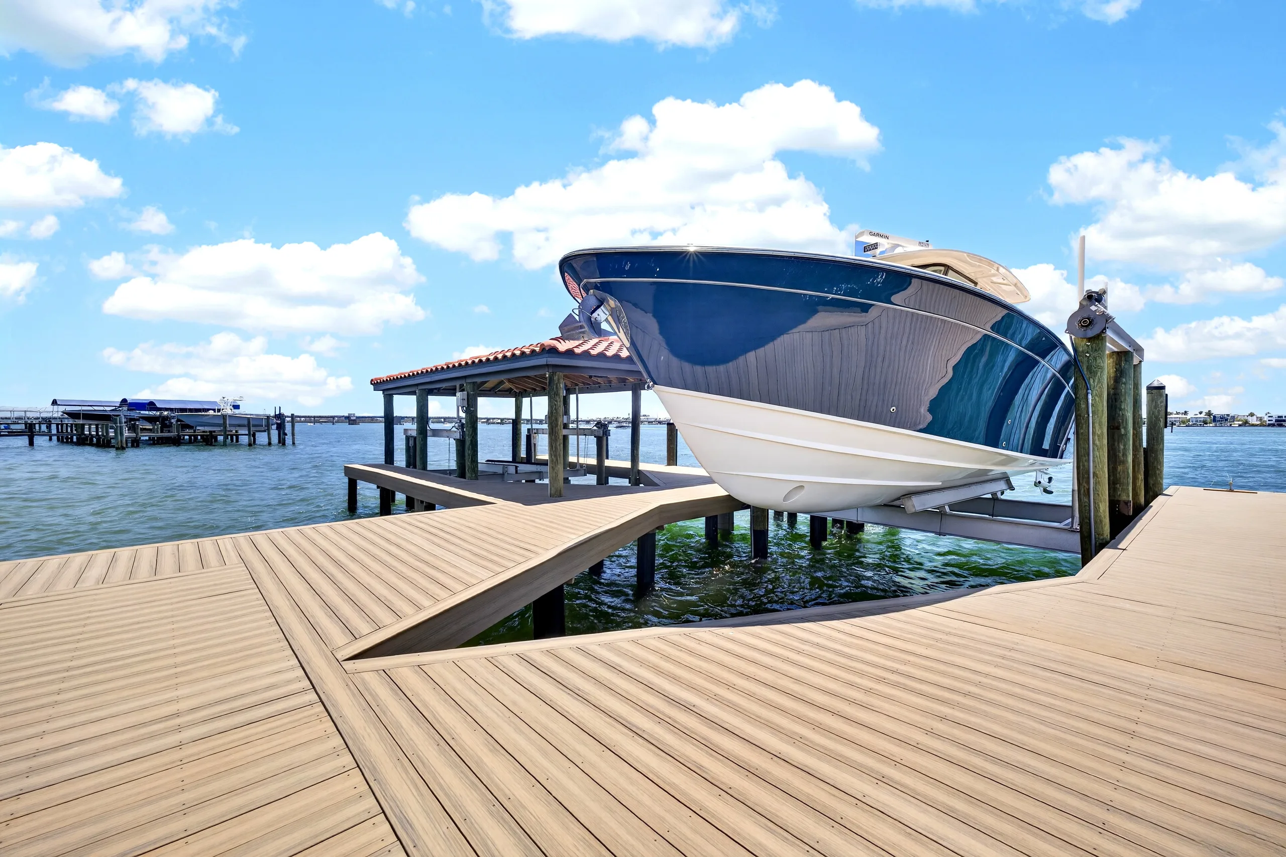 Private dock with covered boat lift